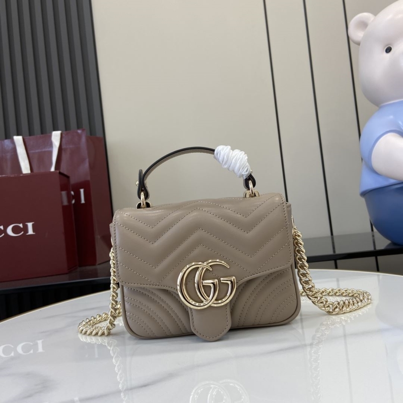 G*u*i top handle bags